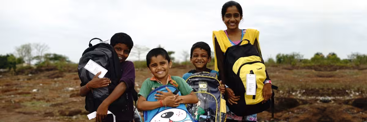 Children With School Bags.